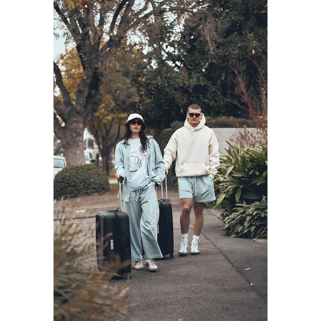 Stripe Travel Pant in Sky - walking campaign